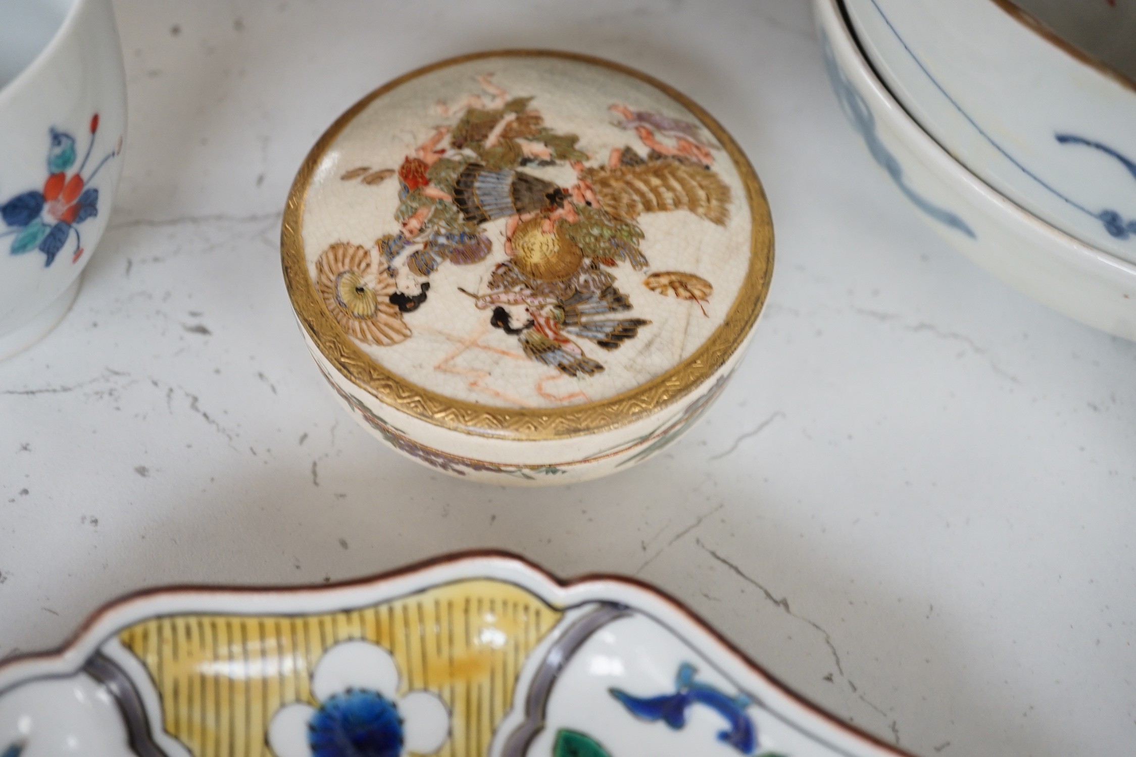 A group of 19th/20th century Japanese ceramics, Including five dishes, three vases, a cup, a Satsuma box and cover and a model of a dog